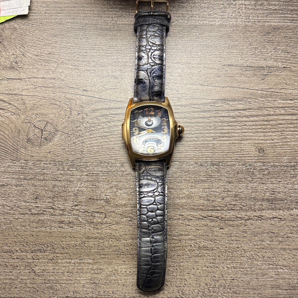 Invicta Gold And Black Watch With Crocodile Pattern